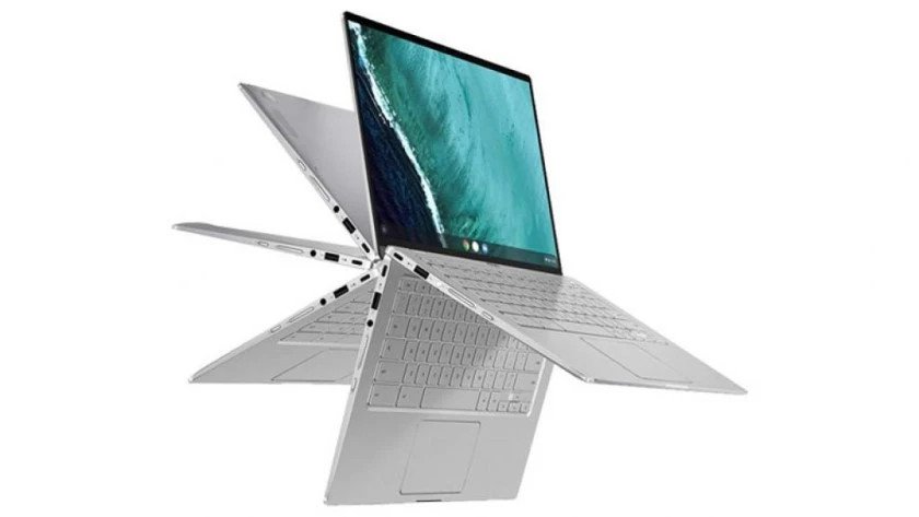 Chiếc laptop chạy Chrome OS màu xám với màn hình hiển thị giao diện hệ điều hành đơn giản, thân thiện với người dùng.