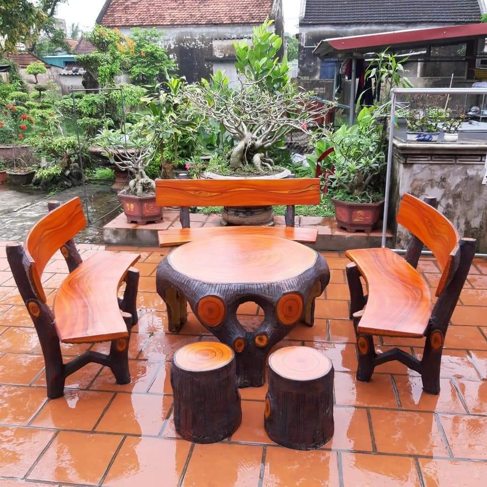 Thiết kế bàn ghế xi măng giả gỗ màu đen sang trọng