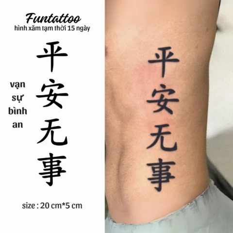 Người với hình xăm chữ Trung tinh tế trên cánh tay